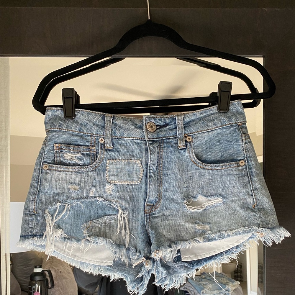 High-Rise Light Wash Ripped Jean Shorts